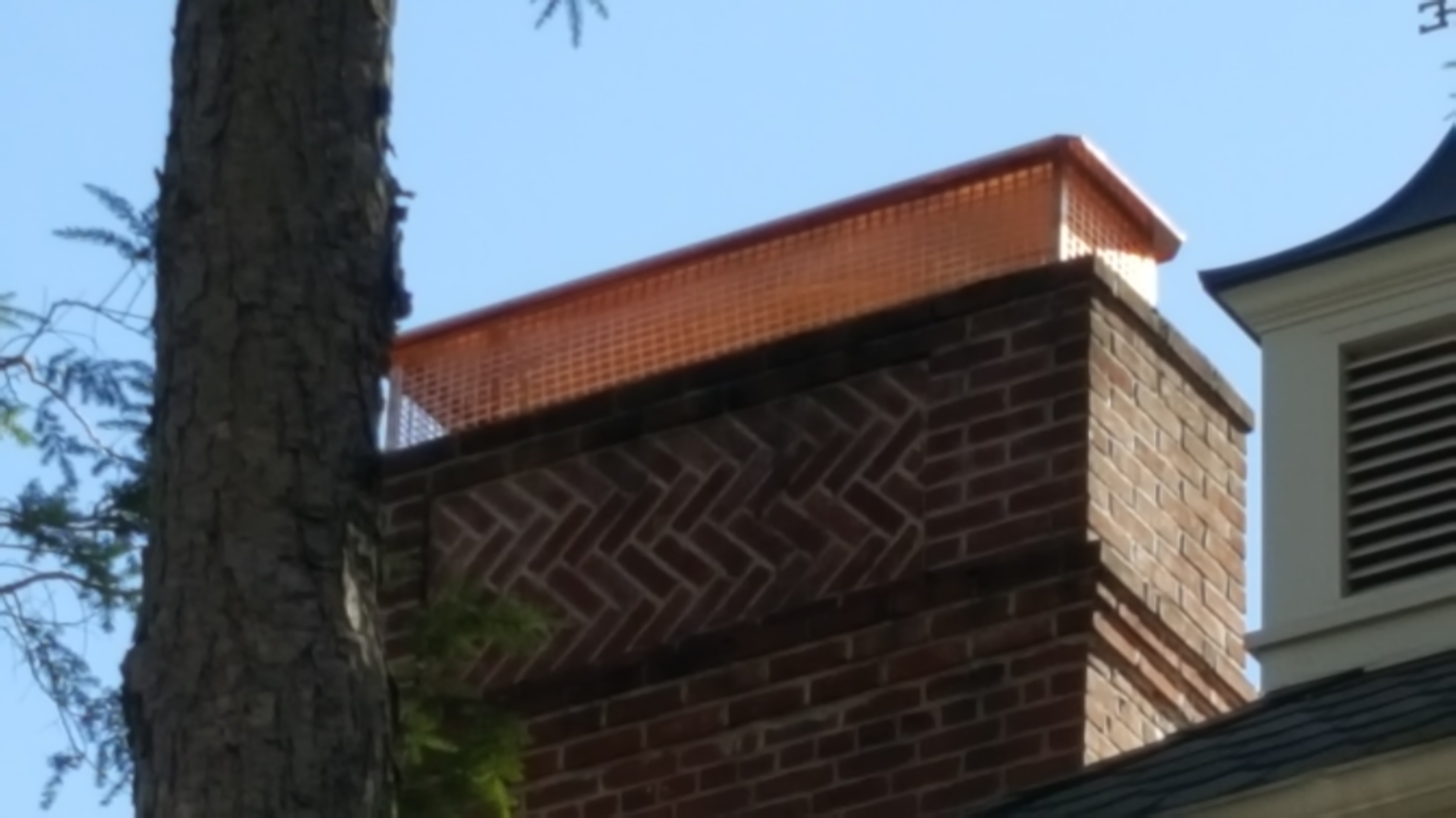New stainless steel chimney cap installed in Oyster Bay, NY